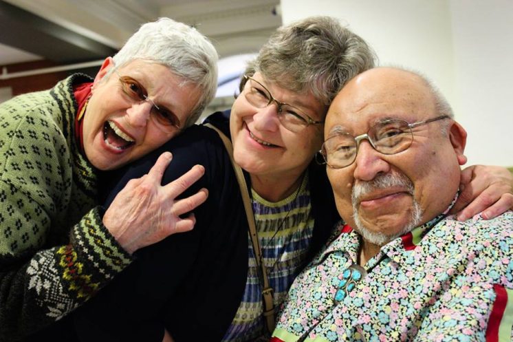Linda Powless (Bob's wife), former Fond du Lac Chairwoman Karen Diver, and Dr. Robert Powless smile for the camera. Photo by Ivy Vainio.